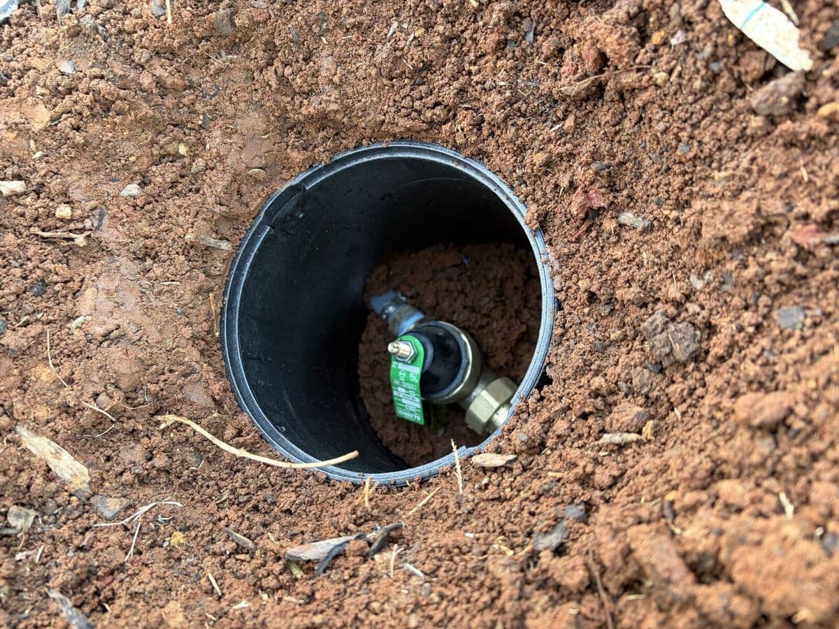 Emergency plumber repairing burst pipe in Huntsville AL