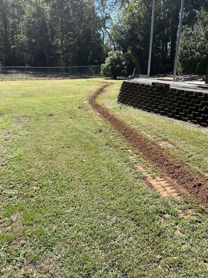 Master plumber installing well pump system in Huntsville AL